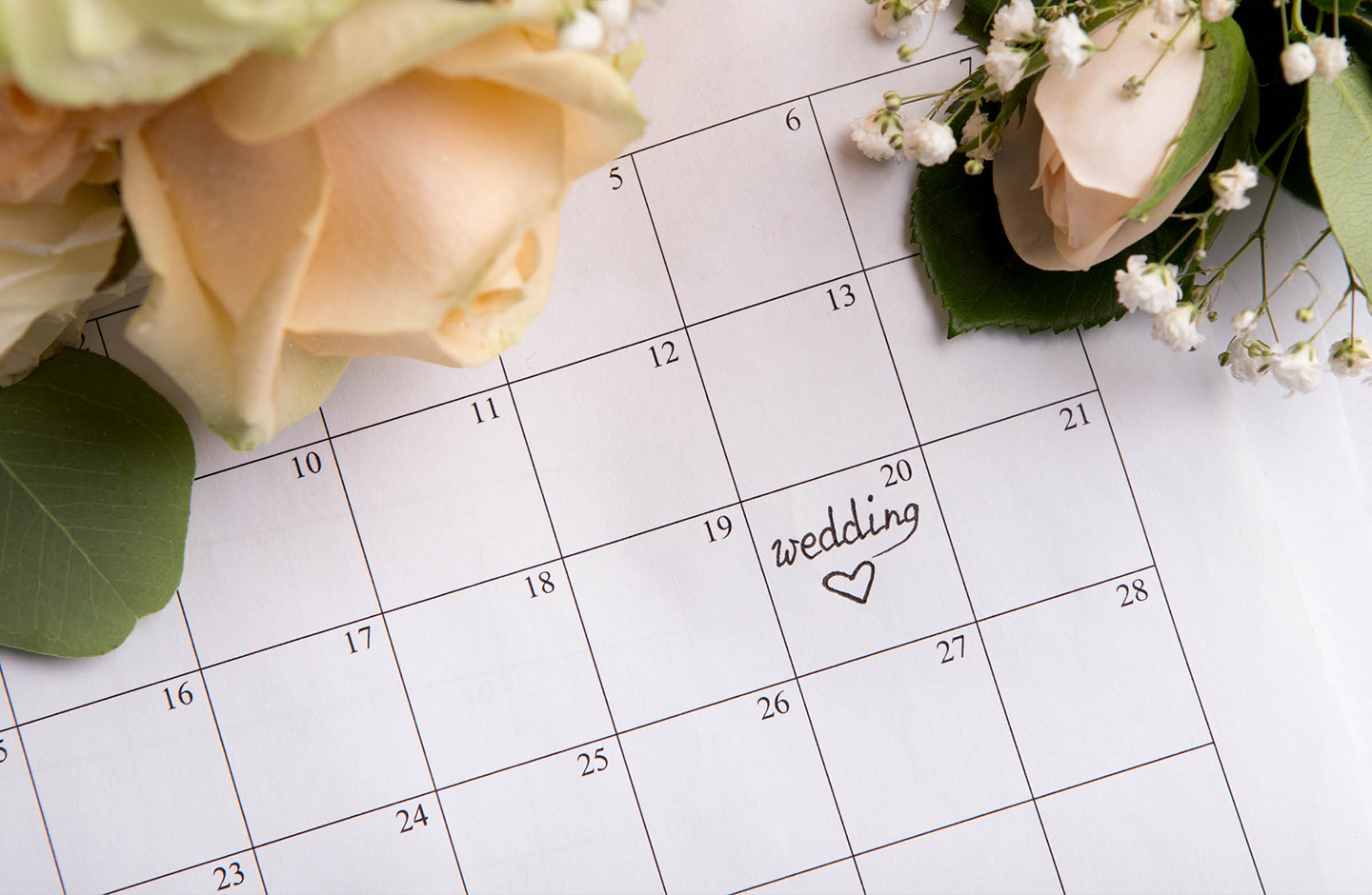 Terminkalender mit vermerktem Hochzeitstermin.